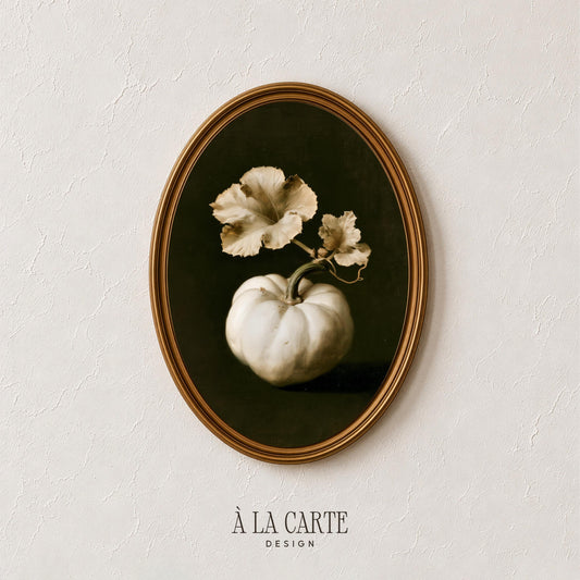 Moody fall wall art for kitchen — pale pumpkin with dried leaves against charcoal background