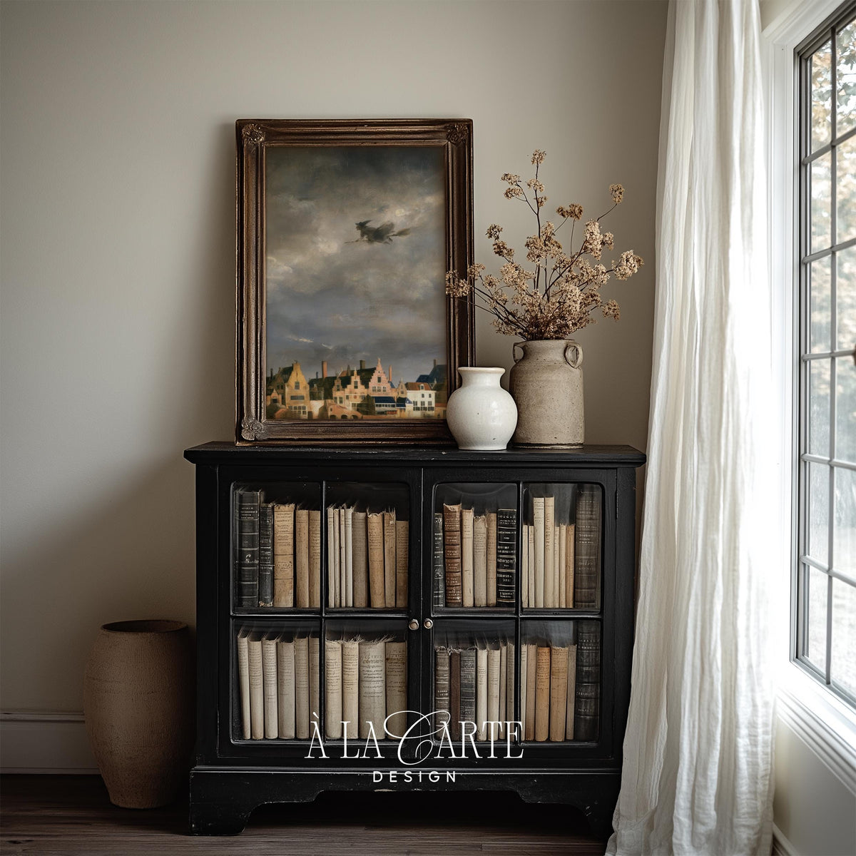 Silhouetted sorceress digital print for living room — antique European village landscape with atmospheric brushwork