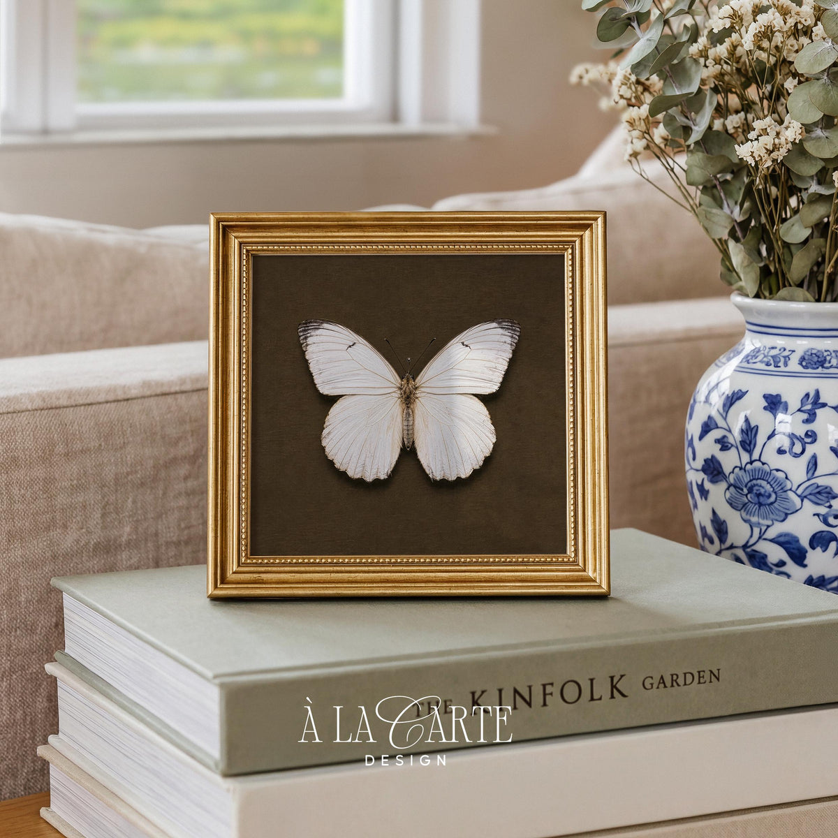 Moody insect artwork digital print for farmhouse gallery wall — pale winged specimen on deep olive parchment vintage style