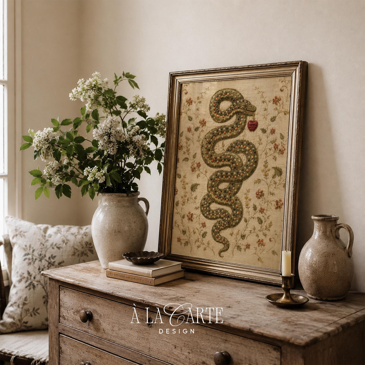 Snake holding fruit wall art print — antique textile-inspired design featuring ornate patterns and delicate florals on parchment background
