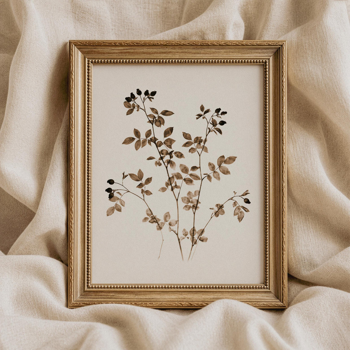 Sepia botanical artwork showcasing scattered leaves and tiny berry clusters on pale backdrop