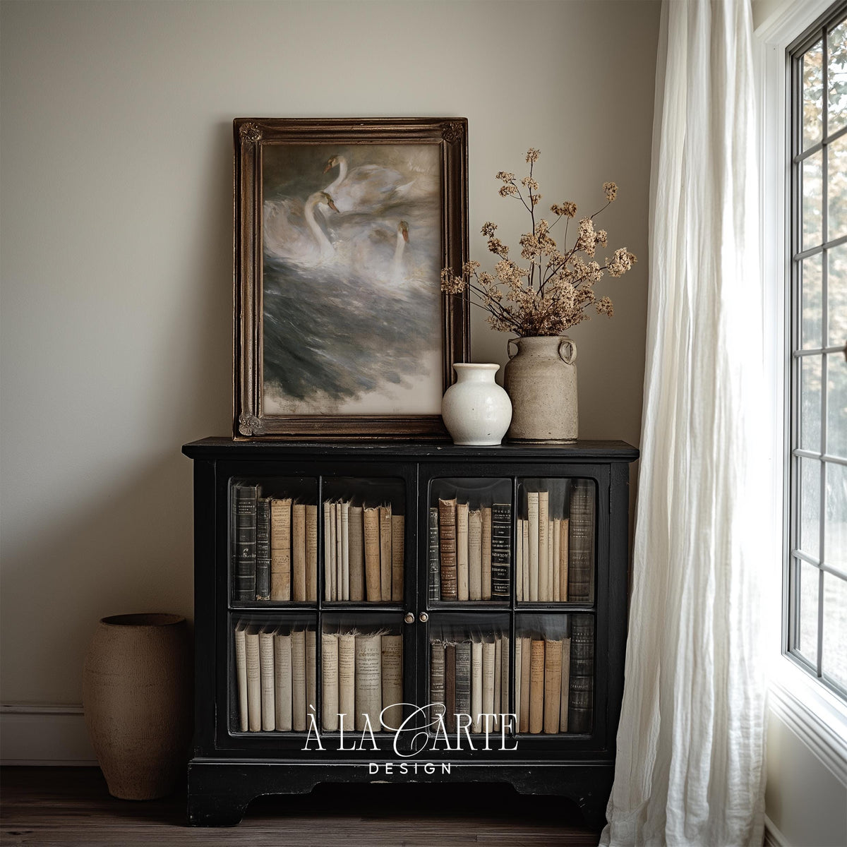 Three swans gliding across dark water printable art for living room — moody vintage painting with muted charcoal and gold tones