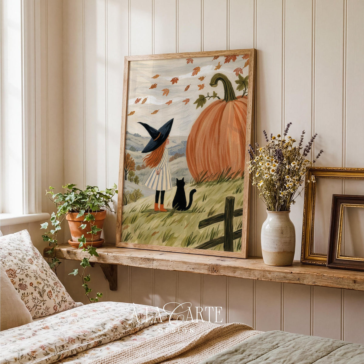 Whimsical harvest scene wall art for living room — girl, black cat, and giant pumpkin in rolling field landscape