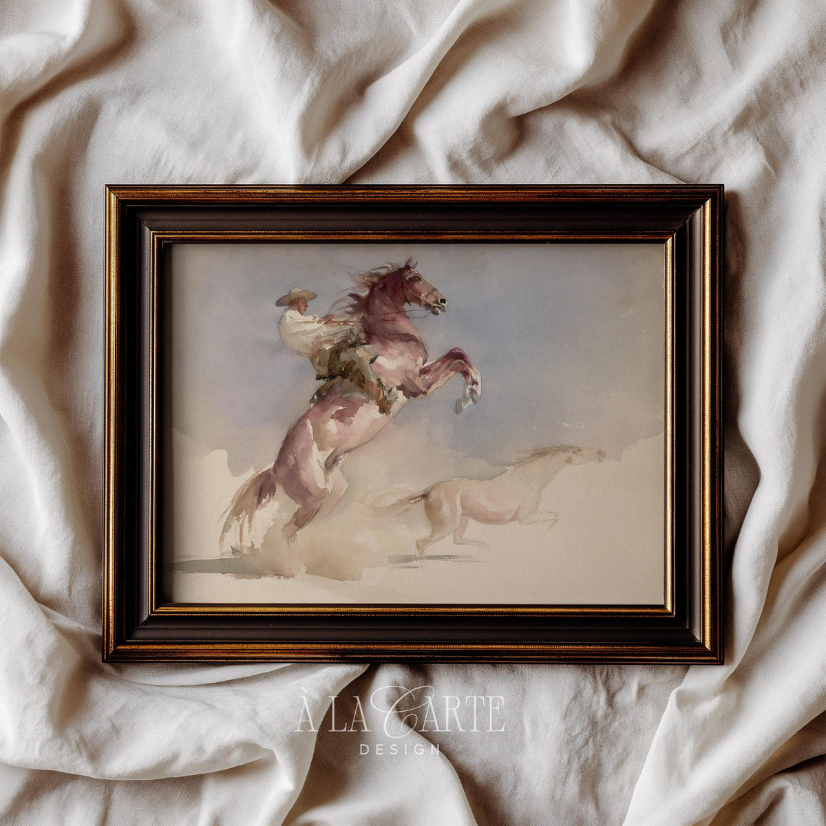 Galloping horseman picture with dusty landscape — soft-focus farmhouse wall art in faded pastels and earthy tones
