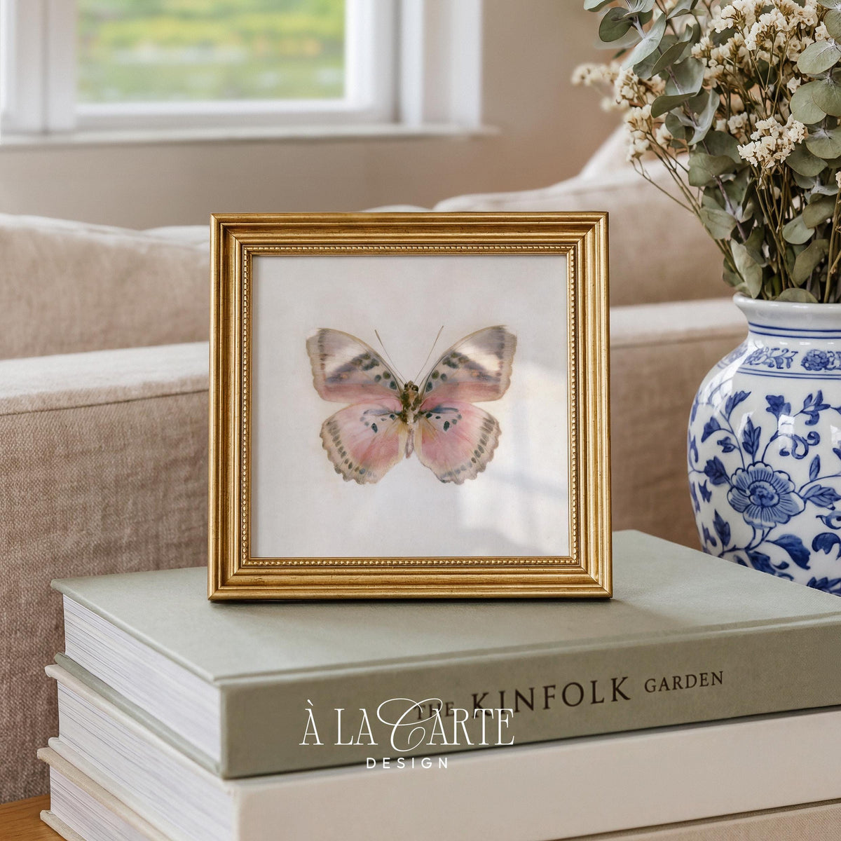 Antique-style insect printable art with symmetrical pink wings and aged collector's plate aesthetic