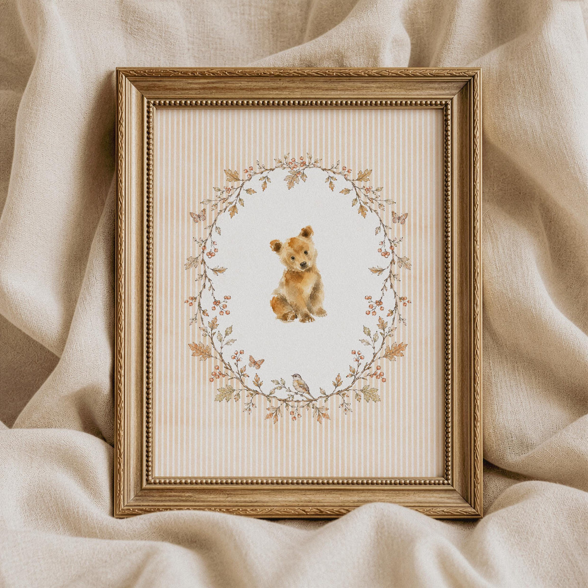 Sweet bear cub portrait digital print for kids' room — delicate oval botanical frame with perched bird and muted autumn tones