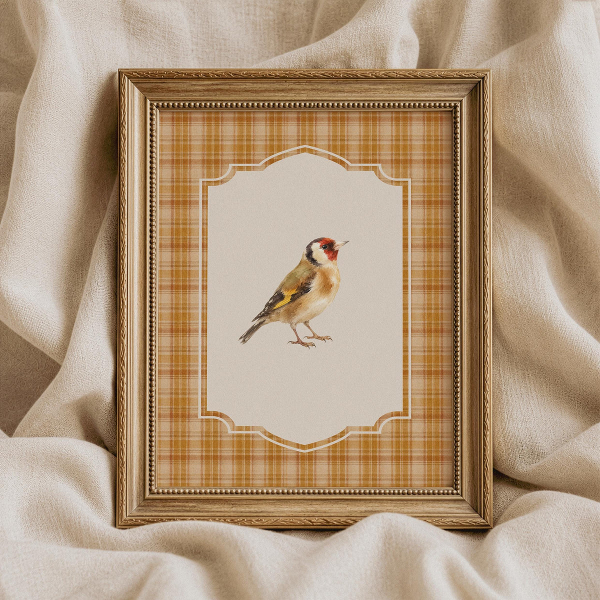 Goldfinch artwork for living room — rustic watercolor songbird with black-white markings and warm orange frame border