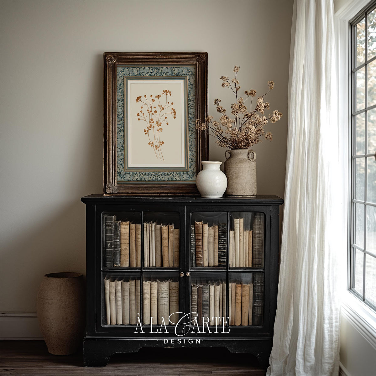 Antique herbarium page wall art for living room — delicate clustered blooms in warm tones with ornate blue-green border