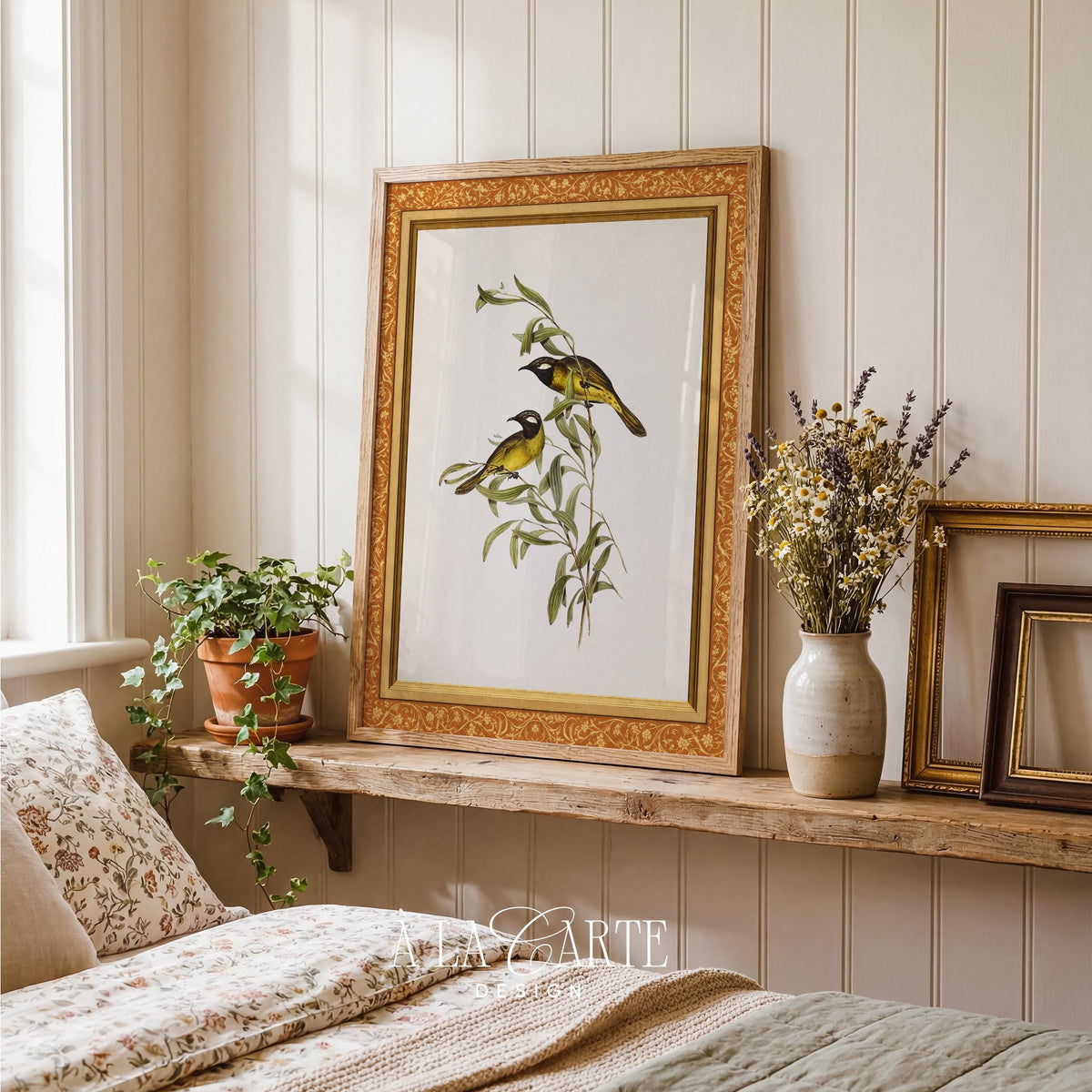Yellow and black songbirds printable art on flowering branch with vintage botanical illustration style