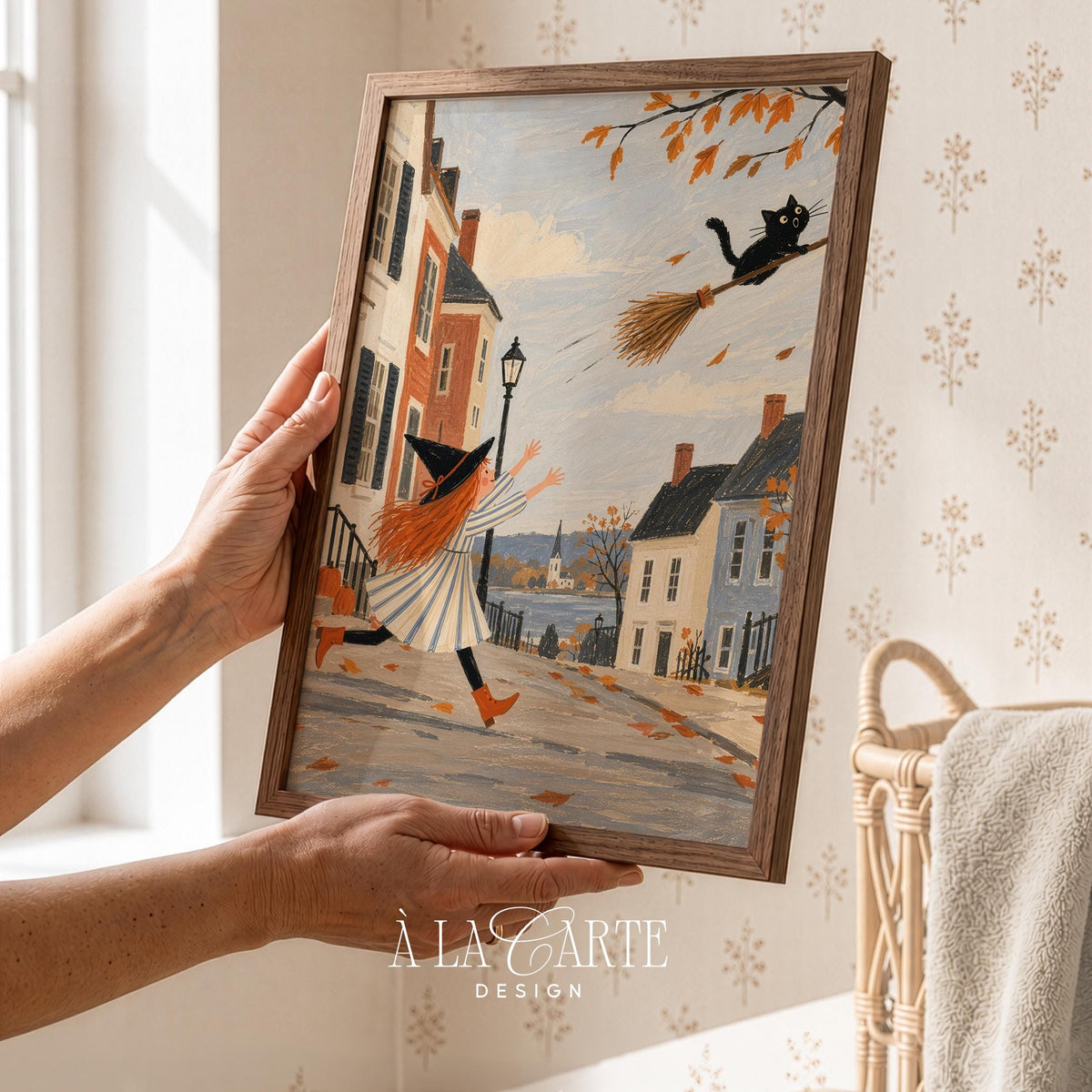 Enchanted broomstick printable wall art for hallway — whimsical cottagecore painting with historic townhouses and church steeple