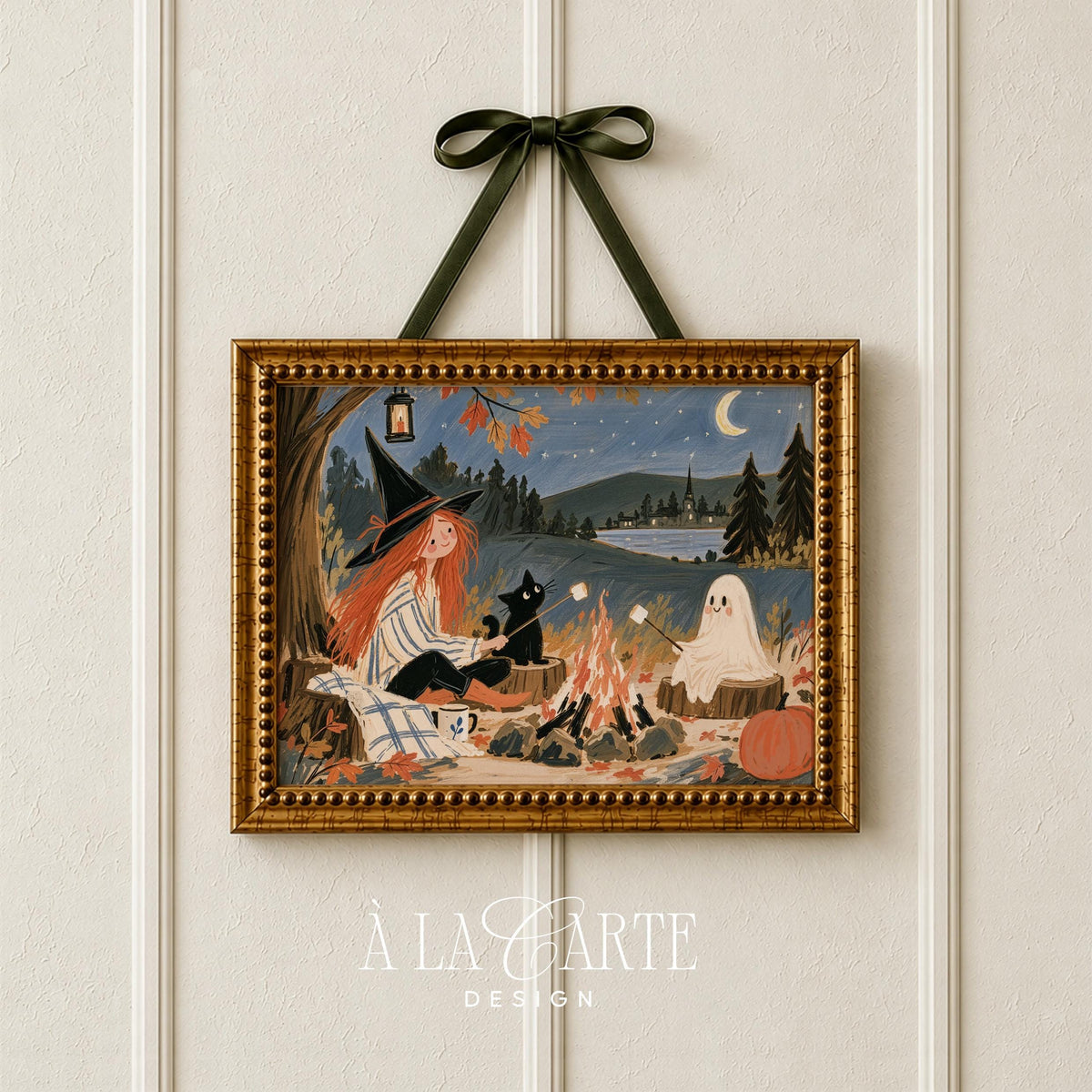 Lakeside campfire painting wall art — whimsical autumn folk art with witch, feline companion, and spectral friend