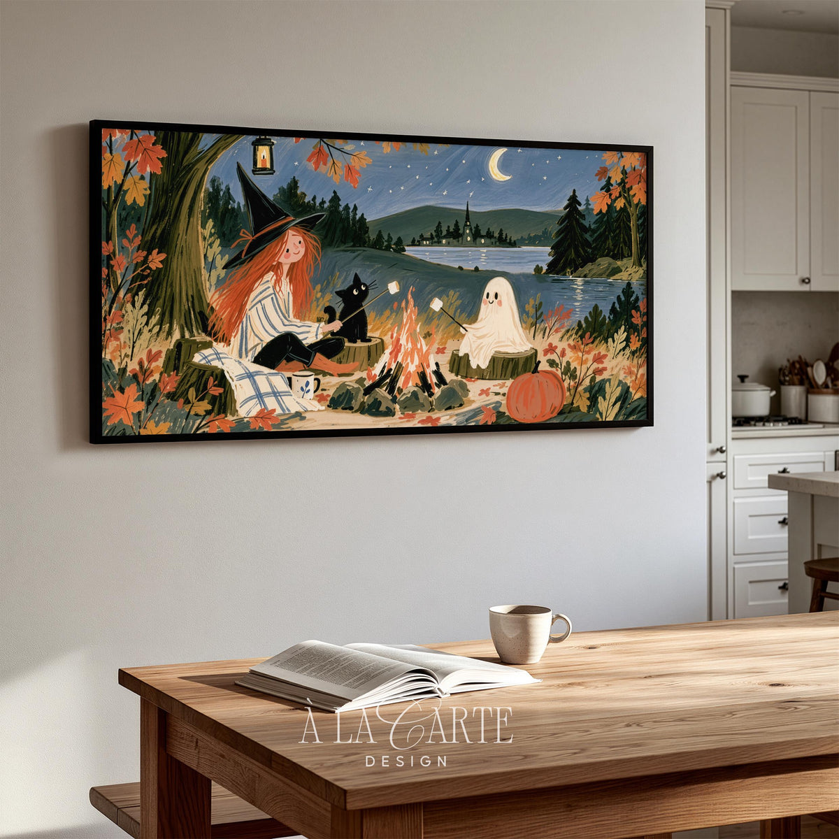Spooky-cozy Halloween artwork television display — witch and ghost companions by lakeside campfire with pumpkins, crescent moon, and rustic charm